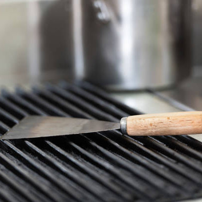 What’s the best way to clean my stainless steel grill?